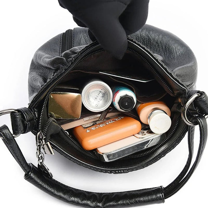 NOORA תיק יד עם שכבות רבות